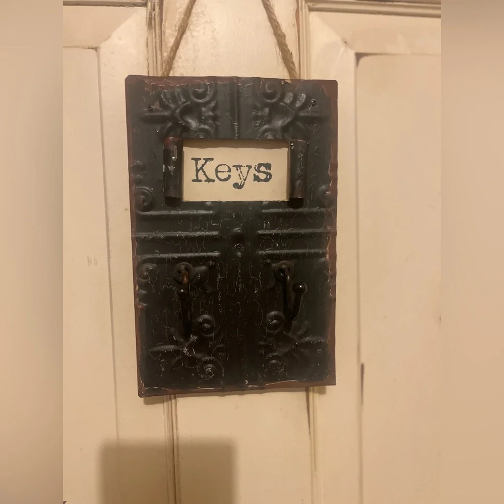 Cute wall hanging for keys with two hooks. Adorable! 8 in X 5 1/4 in